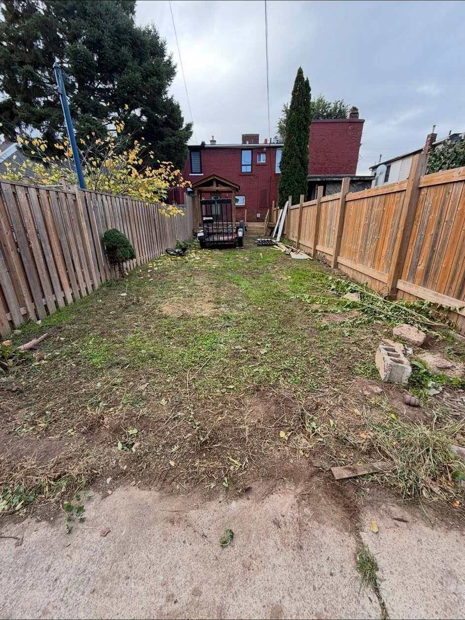 Backyard cleared and ready for grading between new fence lines